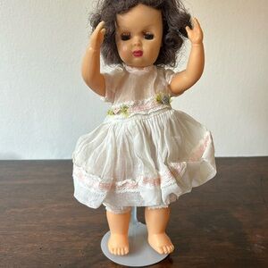 Vintage Doll with White Dress and Pink Accents